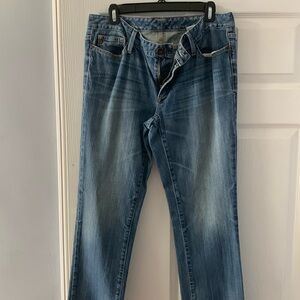 Distressed blue jeans